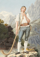 Junger Hirte mit einem Alphorn in der Hand auf einem Felsen stehend 